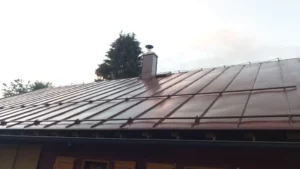 Nástřik plechové střechy Desná